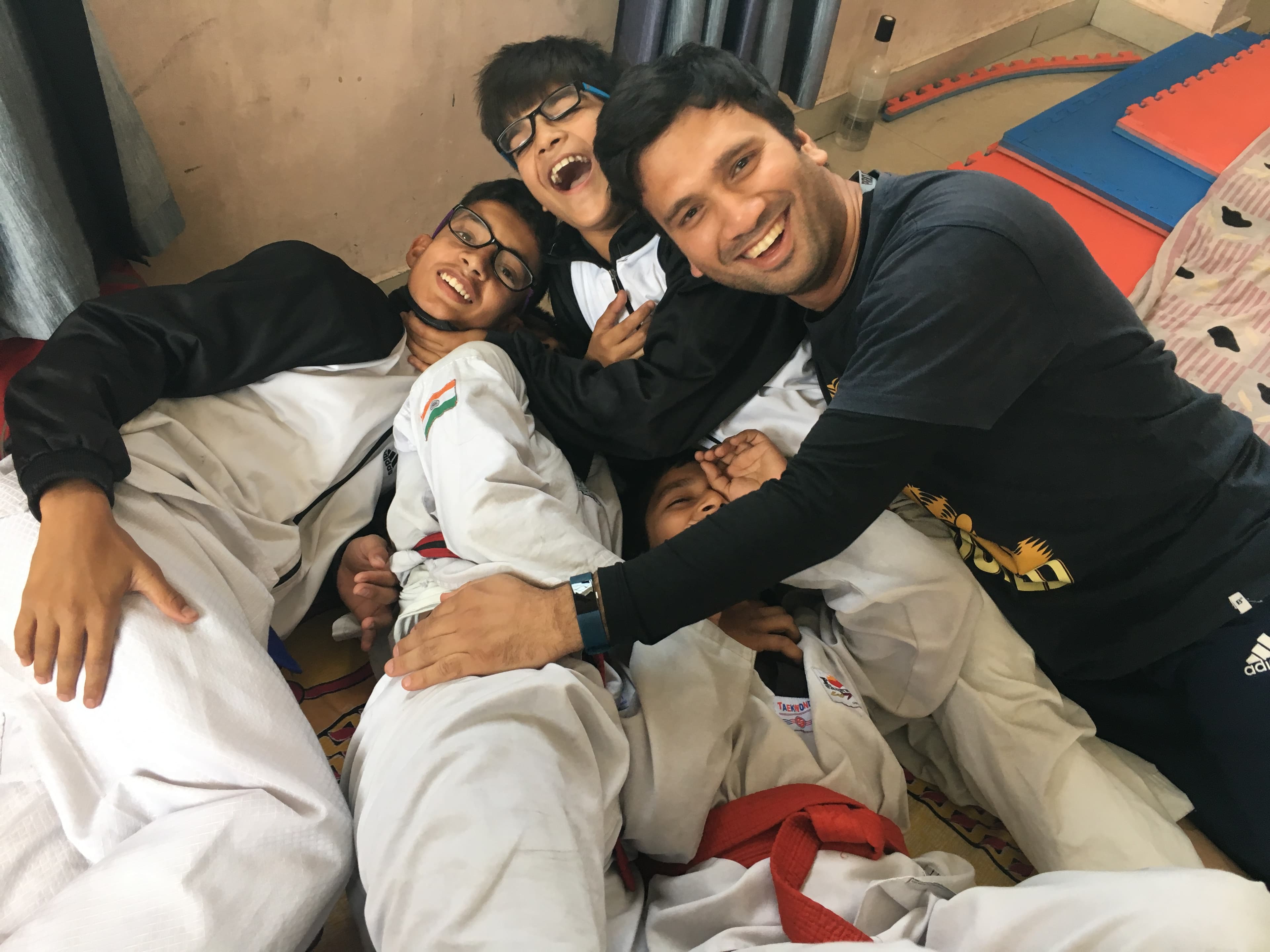 Master Abhishek Joshi sharing a candid moment with his students in the dojang.